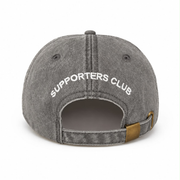 Back view of green Supporters Washed Hat with Supporters Club embroidery