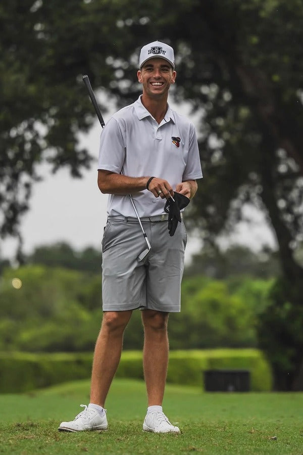 Ethan Gough standing on a golf course holding a club