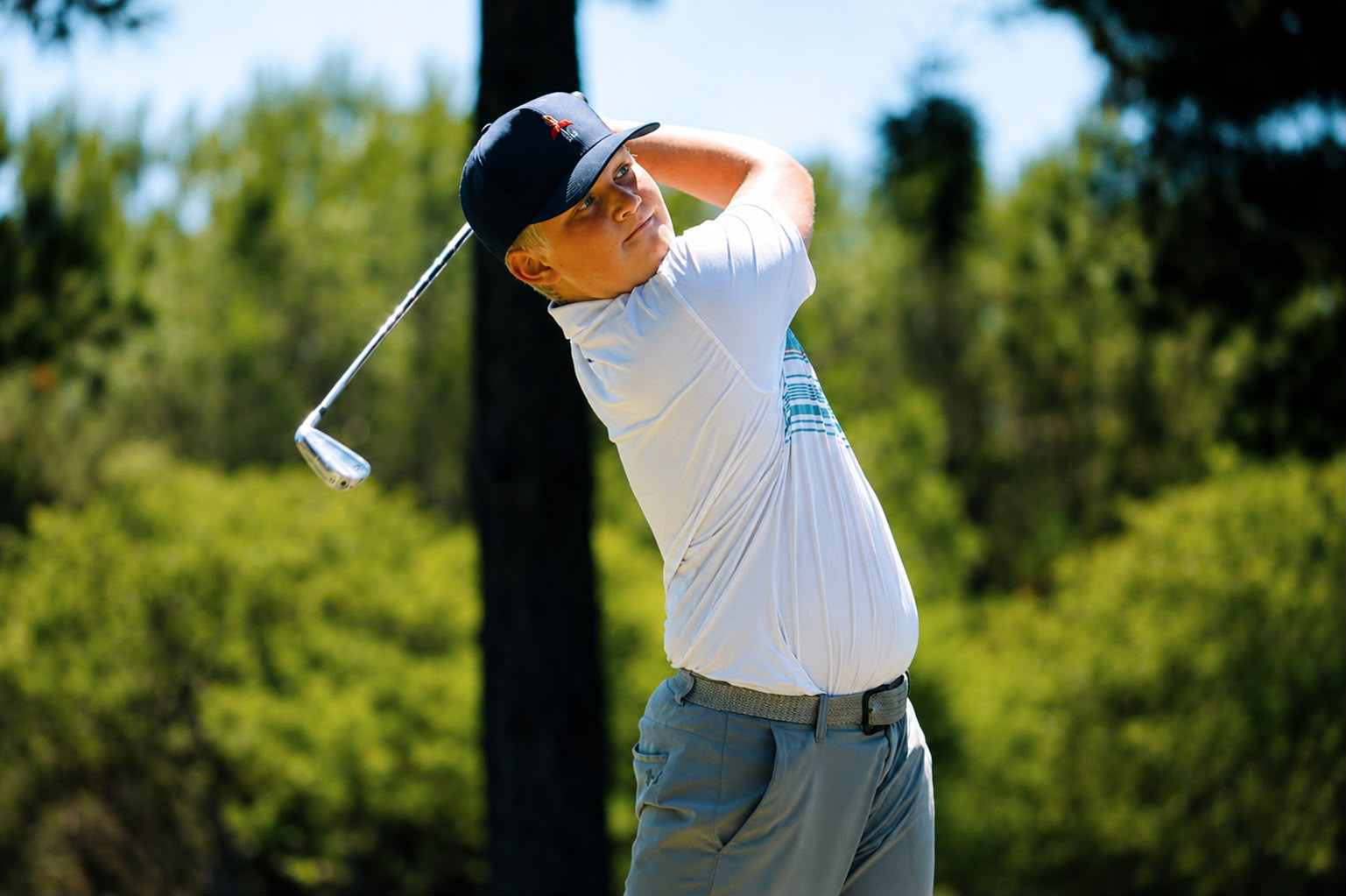 Louw Schoeman following through on a golf shot