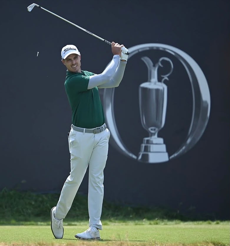 Michael Hollick following through on a golf shot
